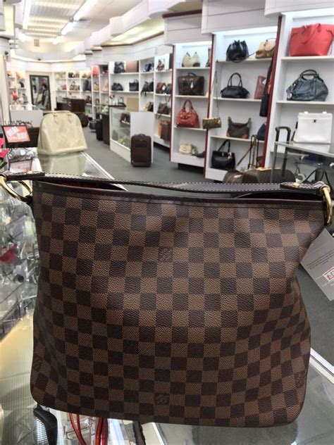 we buy vintage louis vuitton bags in houston tx